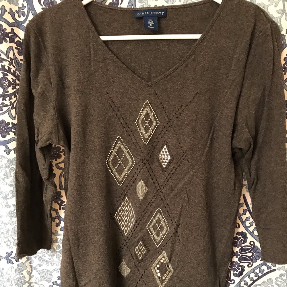 Adorable 3/4 length sleeve embellished top